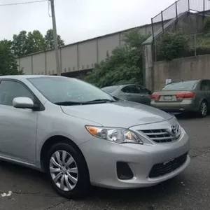 Серебряный цвет Toyota Corolla 2013 модельного..